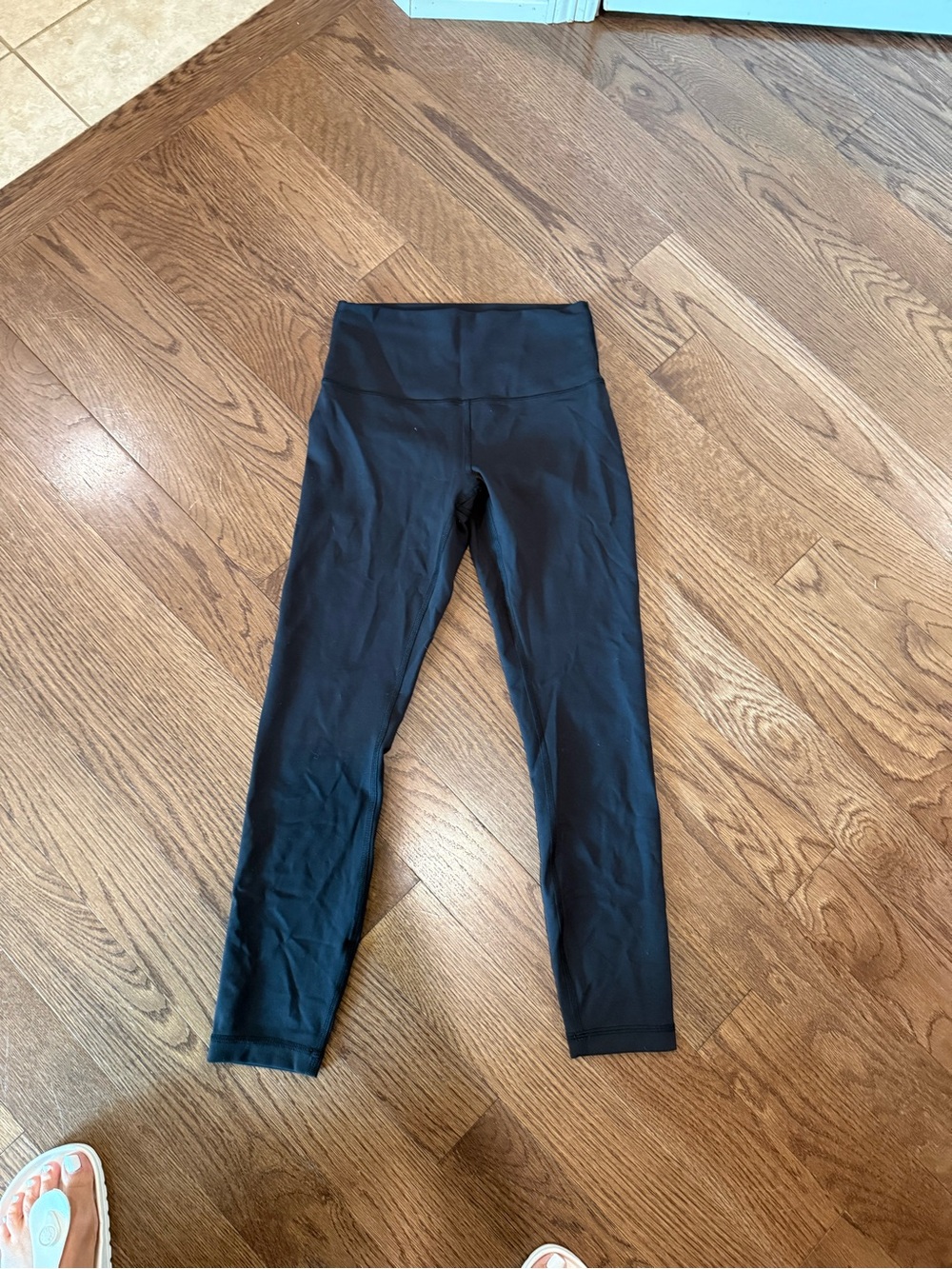 Women’s black Lululemon Wunder Train High-Waist Stretch Leggings
